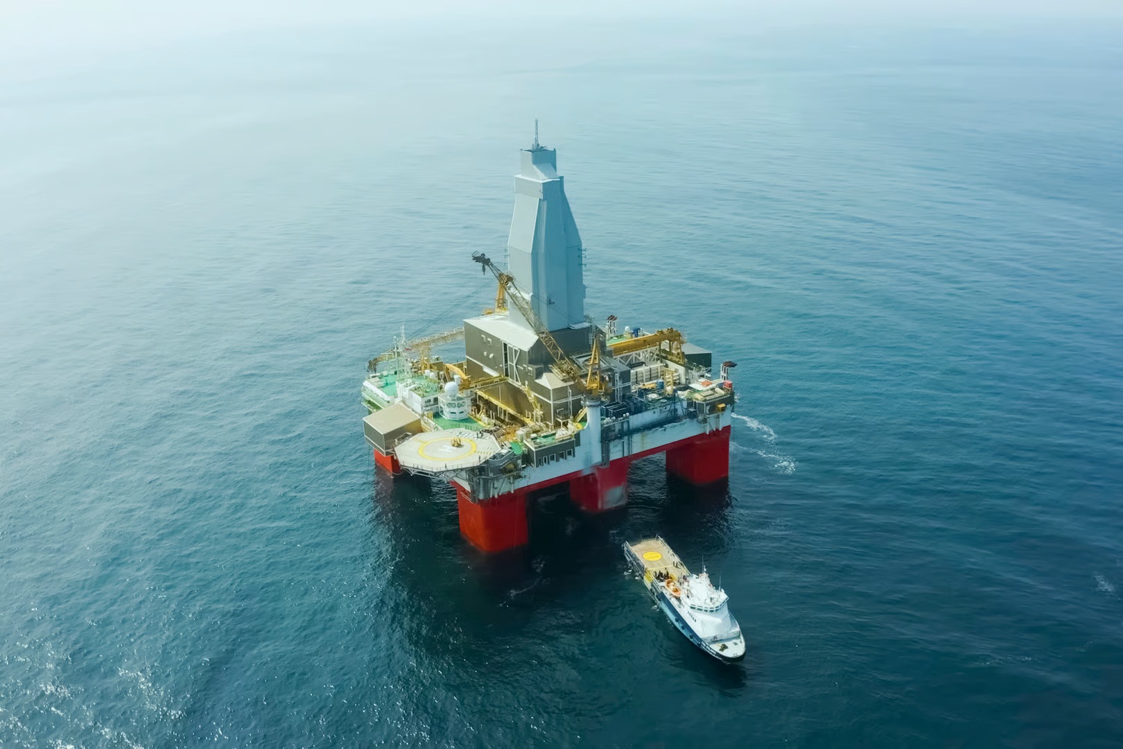 Oil Offshore Platform At Sea And Near It Service Ships For Service And Rescue Service